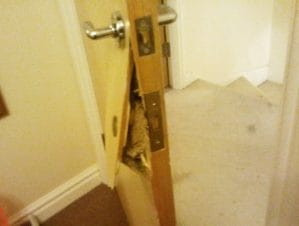 damaged white door