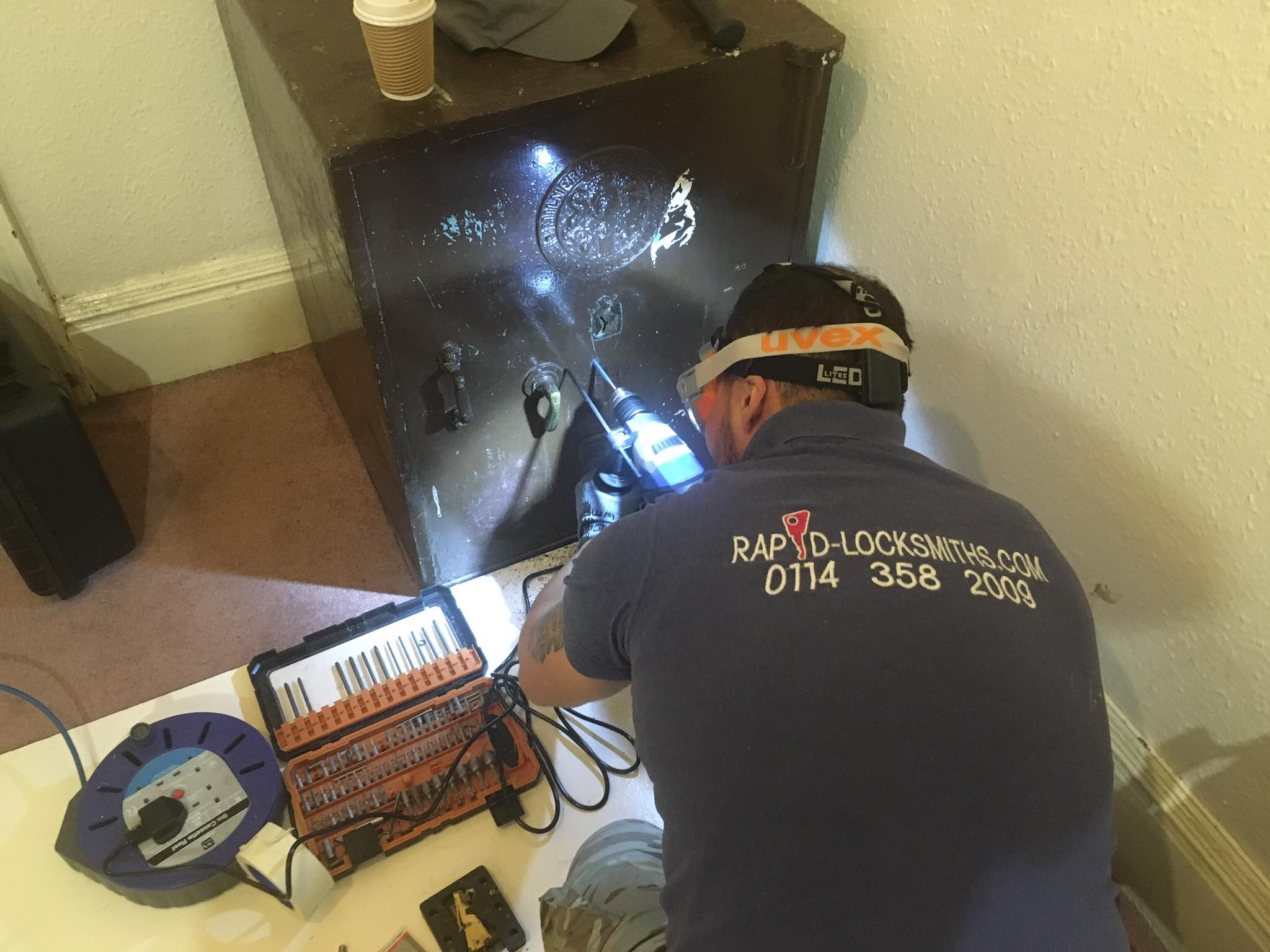 Eyan opening a safe