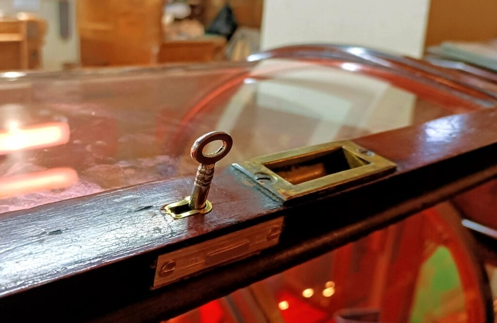Key in Lock with a new lock fitted to an antique cabinet